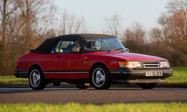 1990 red Saab 900