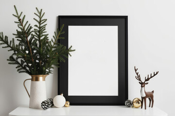 Mockup black poster frame with christmas decoration in home interior, scandinavian style. Christmas deer, branches in a vase on a white table. AI generated