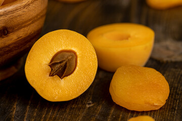 sweet dried pieces of pitted apricots and juicy fresh apricots