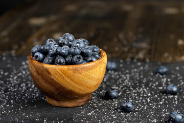 sprinkled with white sweet sugar juicy blueberry berries