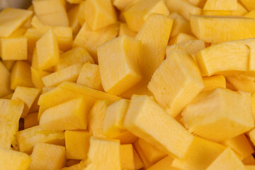 orange pumpkin fruit details cut into pieces for cooking