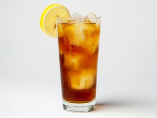 A long island iced tea in a tall glass with a lemon wedge on a white background