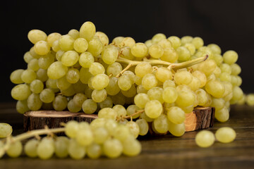 a large number of ripe green grapes are on the table