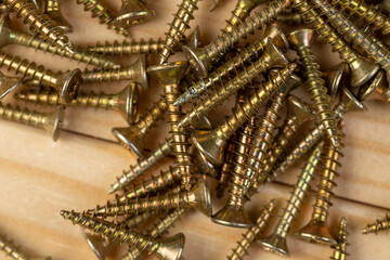 yellow metal self-tapping screws for fixing wooden boards and other wood products