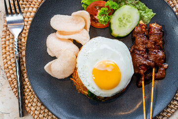 Delicious Fried Rice with Satay and Egg