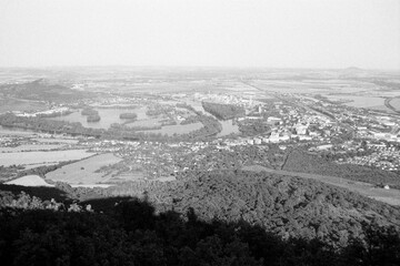 landscape near Lovosice in Czechia on 29. July 2024 on black and white film - blurriness and noise of scanned 35mm film were intentionally left in image