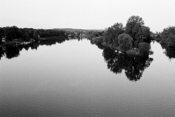 confluence of rivers Labe and Ohre in Litomerice in Czechia on 12. August 2024 on black and white film - blurriness and noise of scanned 35mm film were intentionally left in image