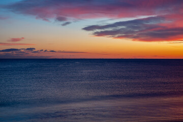 Beach Sunset with beautiful colors and refections.