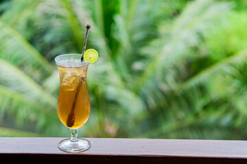 Tropical Cocktail with Lime Garnish