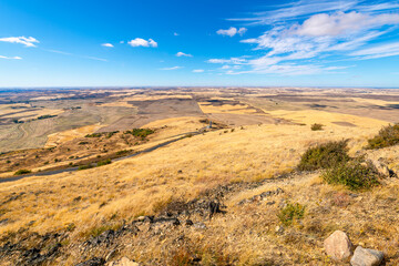 Panoramic views of the surrounding farmlands up to 200 miles away including Idaho, Oregon and Washington at the Steptoe Butte State Park Heritage Site Natural Landmark in Whitman, Washington, USA.