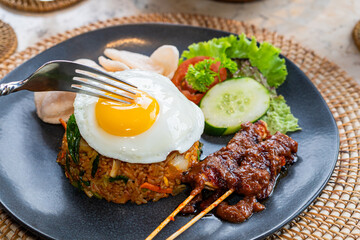 Delicious Fried Rice with Satay and Egg