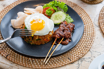 Delicious Fried Rice with Satay and Egg