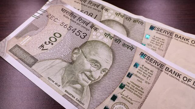 Close up view of brand new indian rupees banknotes. Money background.