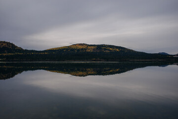 Tranquil Summit Lake is next to the busy Seward Highway on the Kenai Peninsula, Alaska.