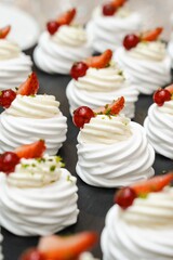 Assorted Meringue Desserts with Strawberries