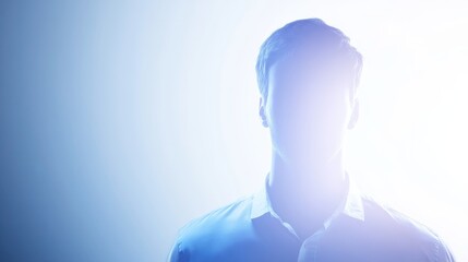 Mysterious figure in soft blue light, creating an intriguing silhouette that evokes curiosity and contemplation.