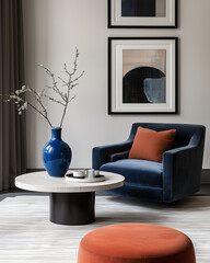 Minimalist interior design of modern living room with navy velvet armchair and orange accents
