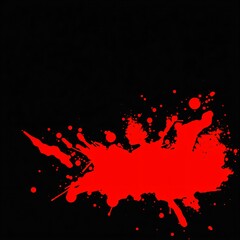 Bright red paint splatter against a black background creating a dramatic and bold visual effect