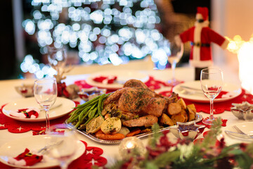 Christmas dinner at fire place and Xmas tree.