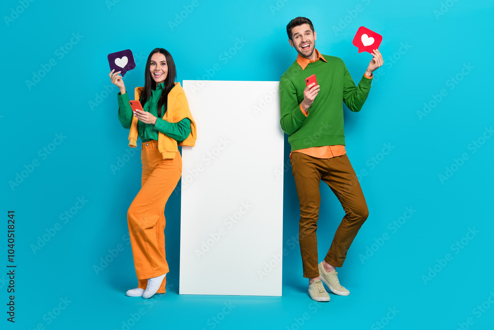 Aufkleber Full length photo of two people blogger board use device receive like network ecommerce post isolated on blue color background