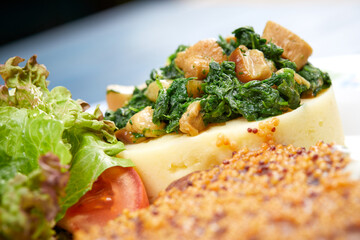 meat with mashed potato and salad