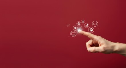 Hand interacting with digital icons on red background