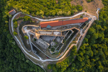 Obraz premium Aerial view of the castle of Visegrad, located on a hill on the banks of the Danube River in the north of Hungary