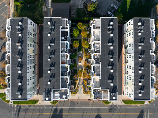 Townhome complex from an aerial view showing rooftops and balconies