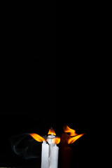 Candle and smoke extinguished Smoke Art on black background