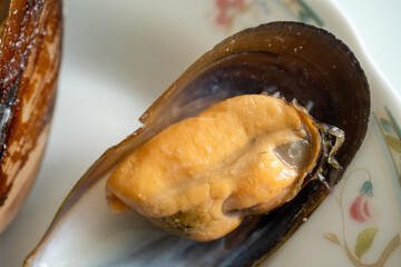 mussels on a antique white plate