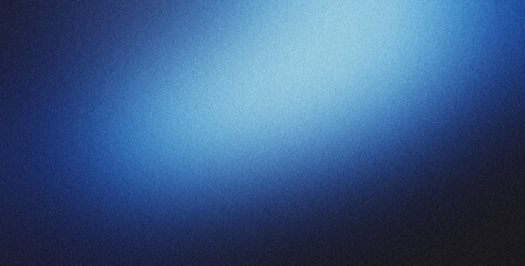 Obraz premium Grainy blue gradient background is fading to black providing a textured backdrop