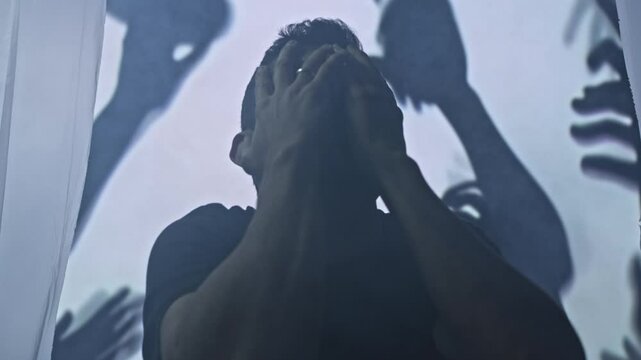 Silhouetted Man Experiencing Mental Health Anxiety Attack Shadow Hands Psychology Disorder Struggle