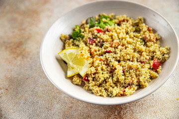 tabbouleh couscous bulgur vegetable dish fresh vegetarian vegan food gourmet food background on the table rustic food top view copy space keto and paleo diet