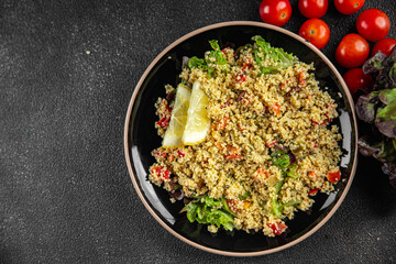tabbouleh couscous bulgur vegetable dish fresh vegetarian vegan food gourmet food background on the table rustic food top view copy space keto and paleo diet