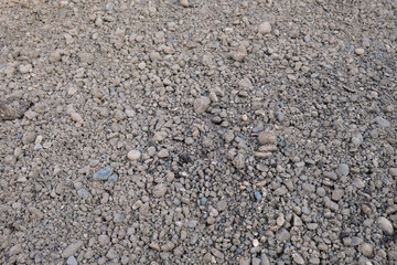 Sand and gravel mixture close-up, bulk building materials for concrete mortar