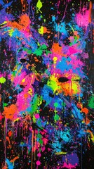 Fototapeta premium Bold, chaotic paint splatters in bright neon colors with a dark base