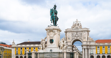 Statue of King Jose I on the sky background with Triumph Arch on the background.