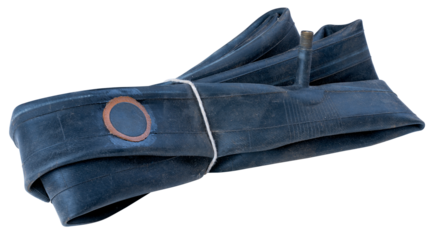 Bicycle inner tube rolled into a roll with a visible patch sealing the hole. Isolated background.
