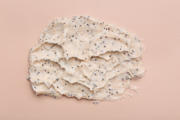 Sample of body scrub on beige background