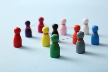Connected figures on blue background. Gossip concept
