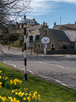 BASLOW, DERBYSHIRE, UK - APRIL 18, 2013:   Signpost for Village Shop 