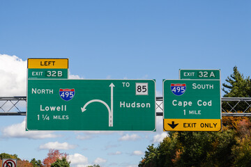 exit 32 A-B signs on Interstate 290 in Marlborough, Massachusetts at  I495 for South toward Cape Cod and North toward Lowell and MA-85 for Hudson
