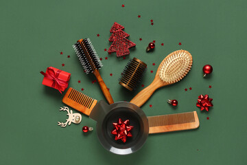 Hairdresser's supplies with gift and Christmas decor on green background