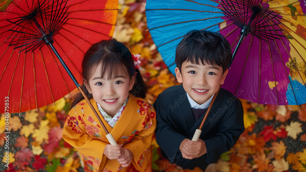 Wall mural 紅葉の中で傘を持つ子供たち