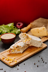 Delicious grilled wrap with chicken, corn, and creamy filling, perfect for lunch or a quick snack