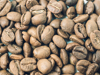 Roasted Arabica coffee beans. food background. coffee, tonic drink, top view, flat lay