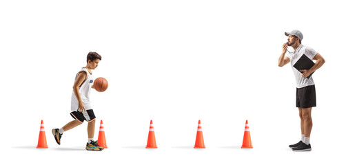 Coach blowing a whistle at a baketball training