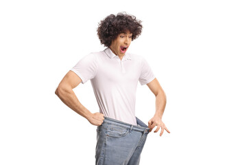 Excited guy looking inside his pants