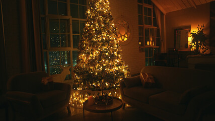Cozy living room with a brightly lit christmas tree, city lights in the background, creating a warm and festive atmosphere