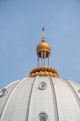 profile view of the cross above the dome of the basilica of our lady of peace in yamoussoukro